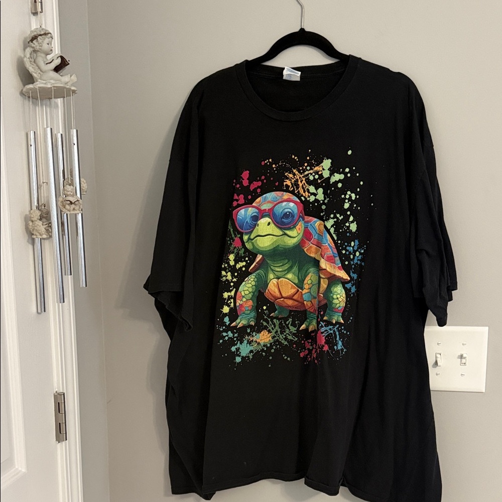Black T-Shirt with Colorful Turtle Graphic